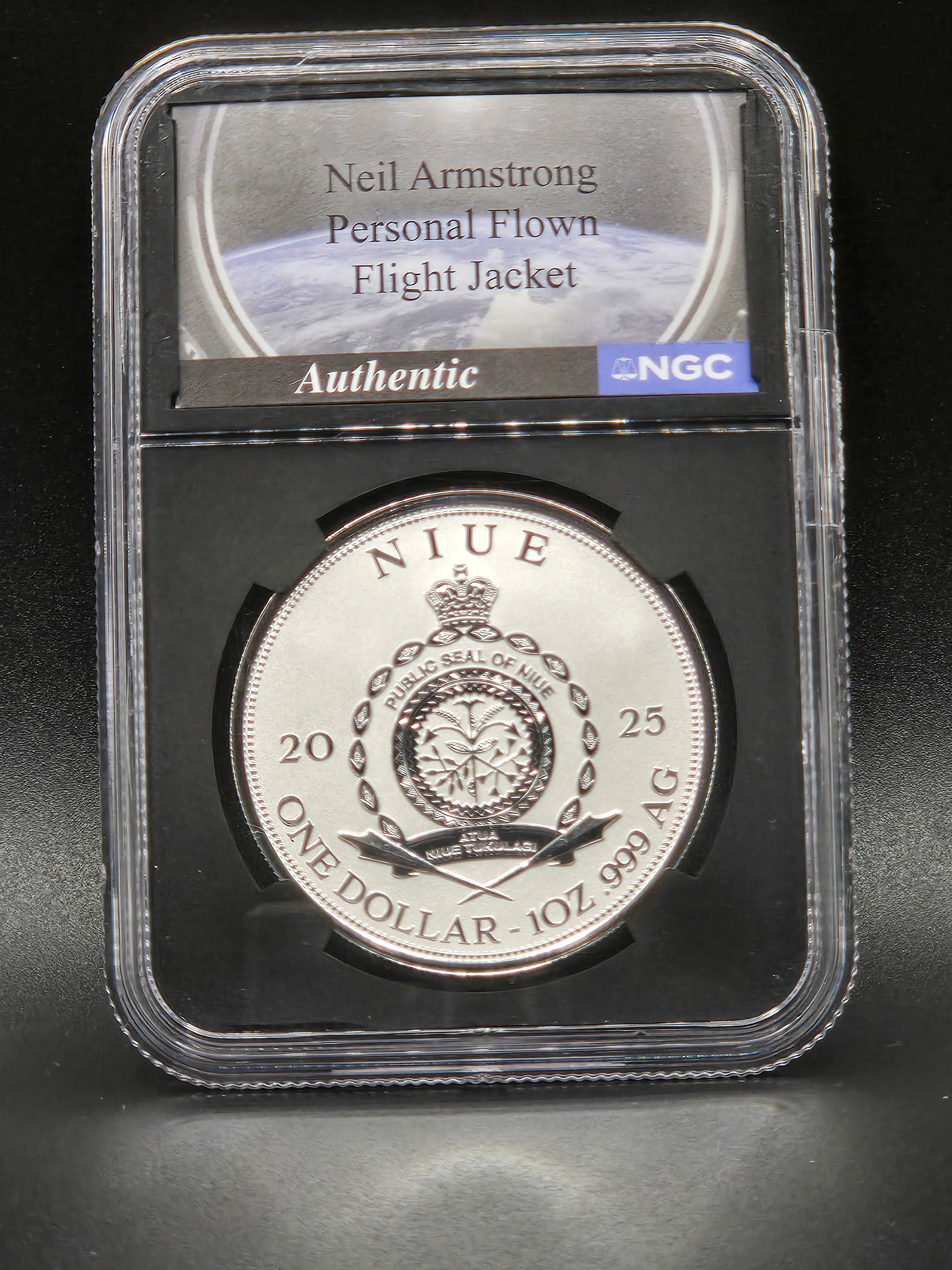 2025 Niue Apollo 11 Landing 1 oz Silver Proof Coin – NGCX Reverse PF10 – Neil Armstrong Flight Jacket Relic
