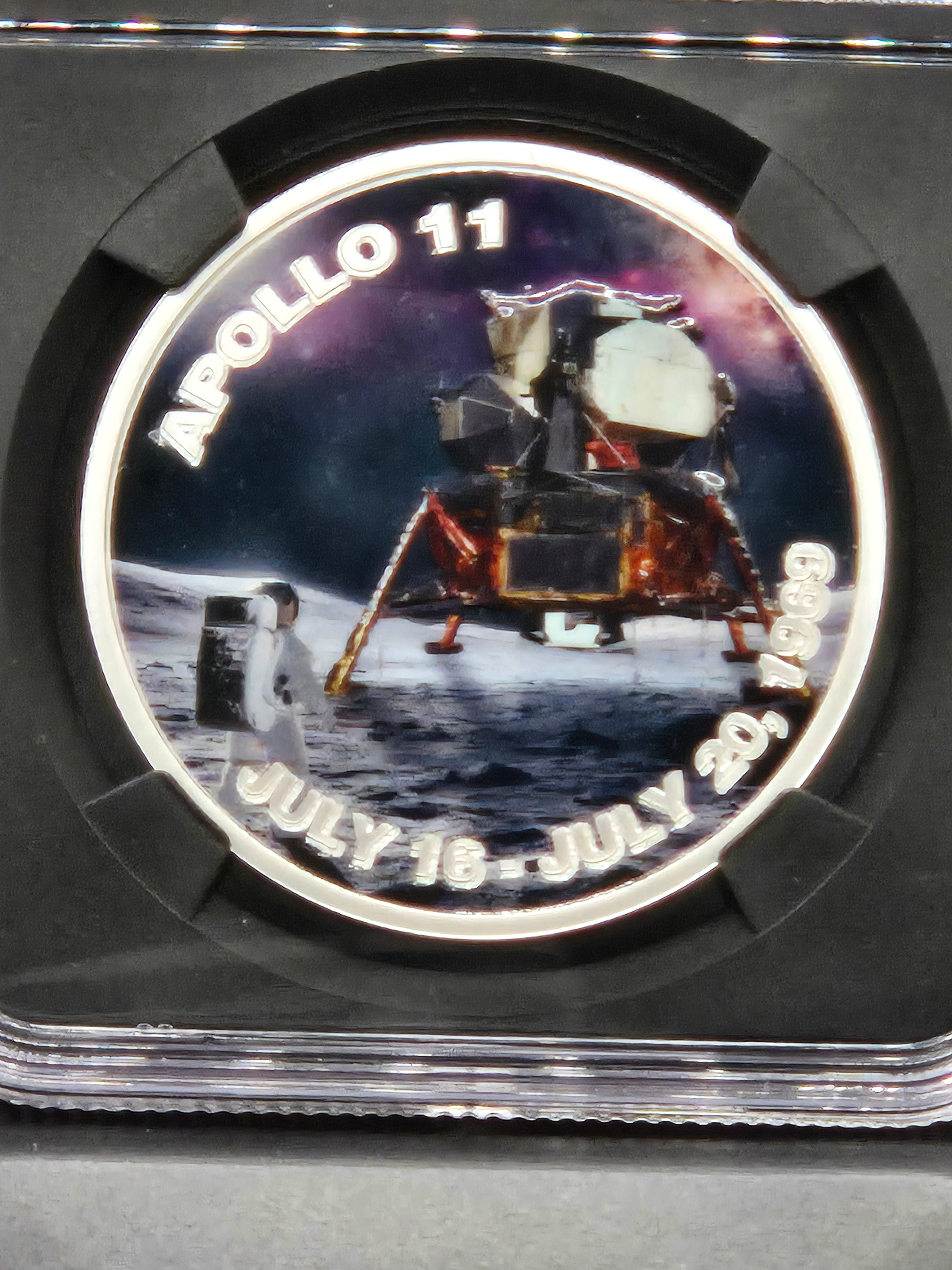 2025 Niue Apollo 11 Landing 1 oz Silver Proof Coin – NGCX Reverse PF10 – Neil Armstrong Flight Jacket Relic